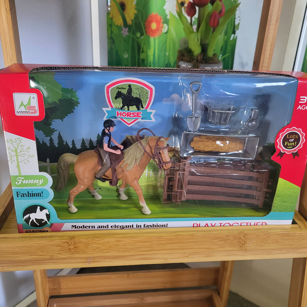 Toy horse and rider with accessories