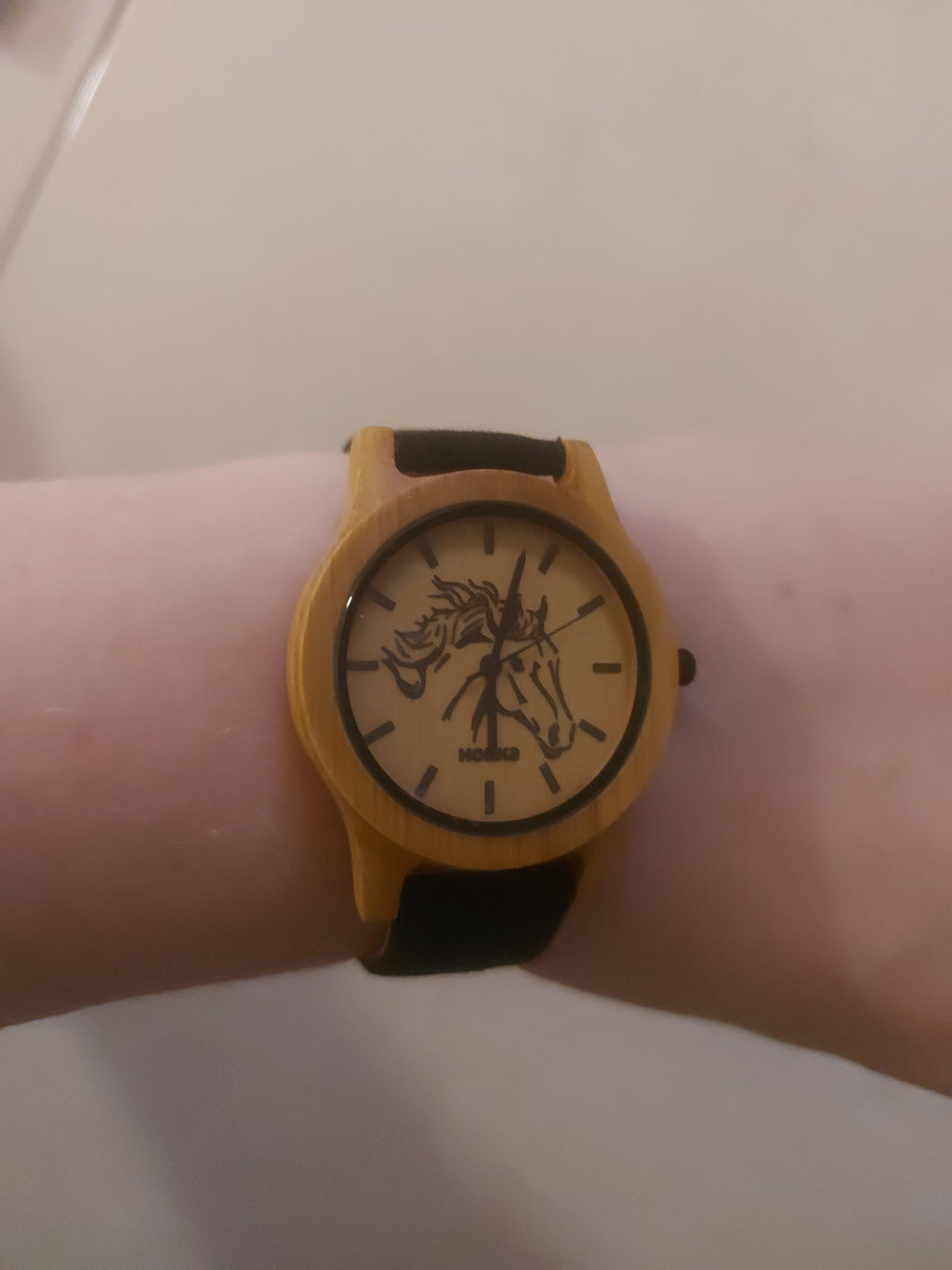 Wooden horses head watcho